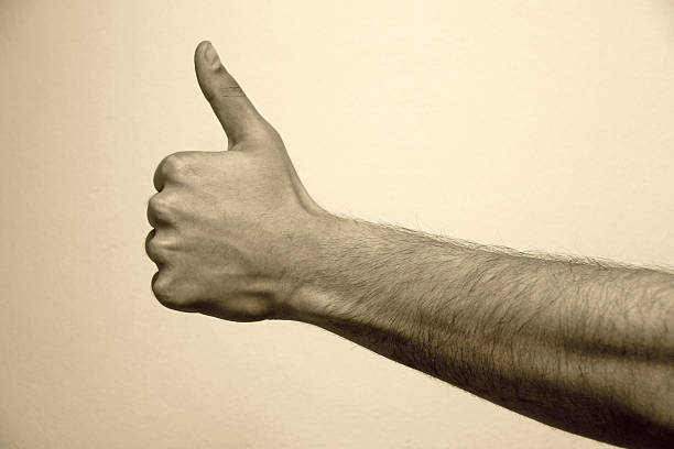 Thumbs up stock photo