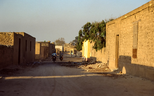 Cairo, Egypt - aug 3, 1991: still in 1991 ancient tombs and inhabited houses coexist in a large cemetery area in the center of Cairo. The inhabitants, mostly displaced, occupied the buildings between the graves. Currently the area has been redeveloped.