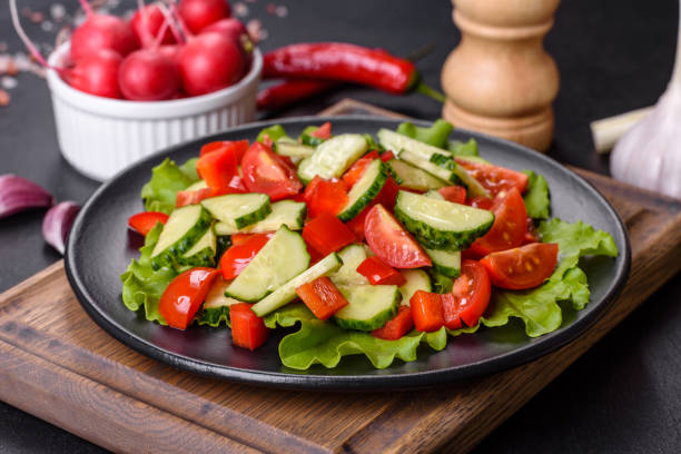 istock Lettuce, cucumber, spinach, tomato and quail eggs salad with herbs and lemon 1397156752