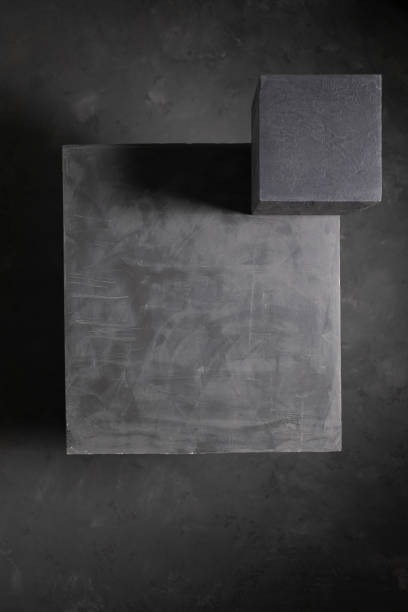 istock Concrete cube on abstract cement floor background texture. Geometric model concept 1397157781