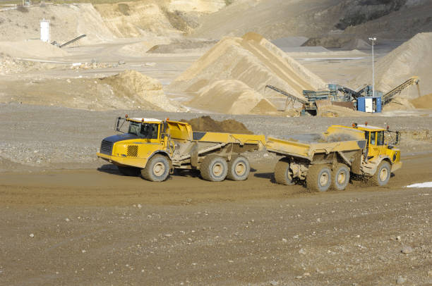 istock Yellow dump truck in mine 1397158997