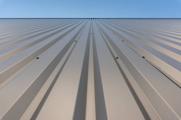 trapezoid corrugated sheet metal Facade of a warehouse. stock photo