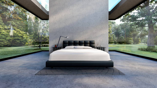 istock Bedroom interior in modern loft cement room with empty cement wall and clear glass window with garden view, 3d rendering 1397167408