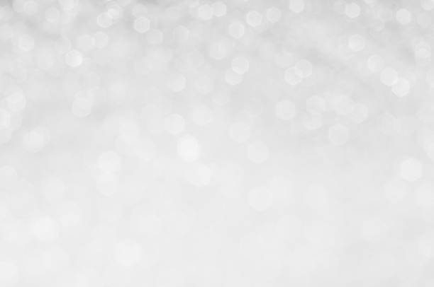 istock Abstract of Bright and sparkling bokeh background. silver and diamond dust bokeh blurred lighting from glitter texture . 1397169581