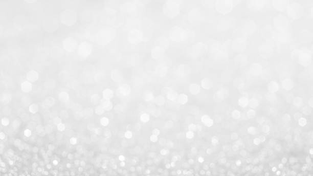 istock Abstract of Bright and sparkling bokeh background. silver and diamond dust bokeh blurred lighting from glitter texture . 1397169590