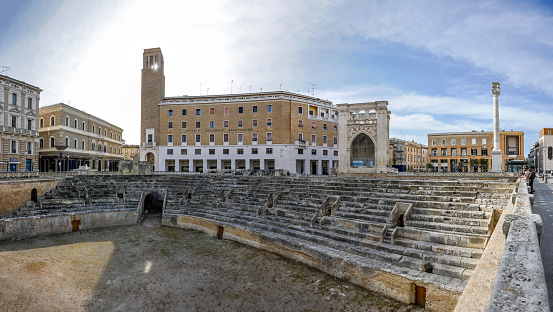 Lecce, Italy - April 15, 2022 : Roman amphitheater, built in the 2nd century AD, Piazza Sant'Oronzo, Lecce.