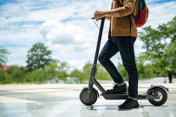 istock An Asian man rides an electric scooter to work. 1397171033