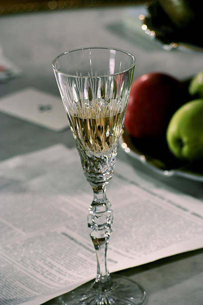 The goblet with champagne on the table stock photo