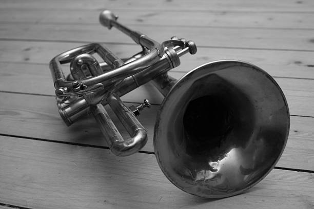 istock Trumpet on wood floor 139717707