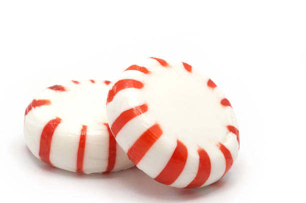 istock Pink image of 2 candy peppermint sweets 139717980