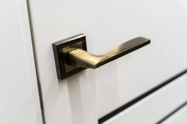 istock Interior light door with golden handle, door handle, interior details 1397181572