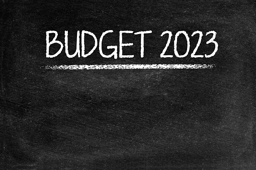 Budget 2023, computer graphic on blackboard.