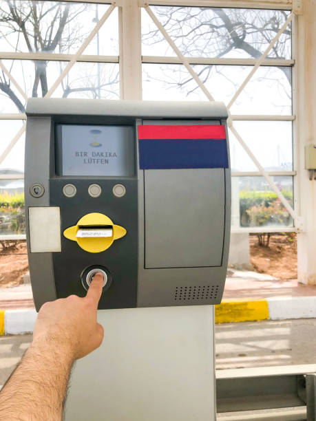 automatic ticket system at the entrance of the parking lot - airport airport check in counter ticket ticket machine imagens e fotografias de stock