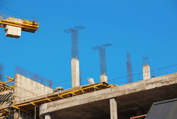 istock A worker prepares formwork for a modern metal-concrete structure of a residential building. 1397186356