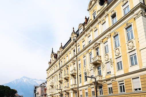 Meran/Merano, Trentino-Alto Adige/Südtirol, Italy - March 29, 2022: Low angle view of a building in the Old Town.