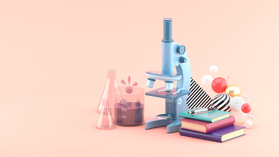 Microscopes, books and test tubes amidst colorful balls on a pink background.-3d rendering.