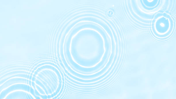 istock The surface of light on the light blue transparent swimming pool water background. Abstract wavy background. Water waves in sunlight banner. Trendy banner for cosmetic facial concept 1397190071
