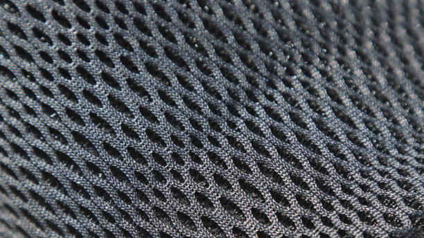 istock Panoramic texture of black and gray carbon fiber. Black background knitting pattern. 1397192151