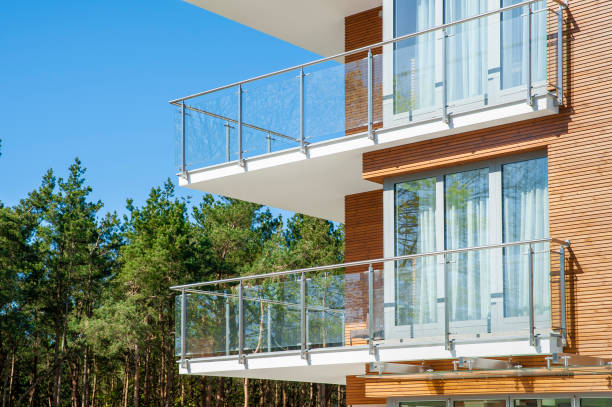 istock Modern residential building with huge terrace and wooden facade elements 1397195327