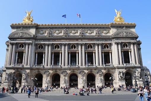 After 2 years of Covid 19 , with a beautiful weather, on April 29th 2022, tourists visit the opera Garnier in Paris