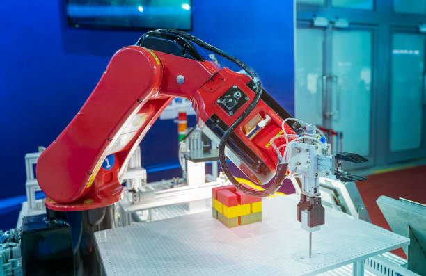 istock Automatic industrial robotic robot working, industry 4.0 and technology concept 1397198626