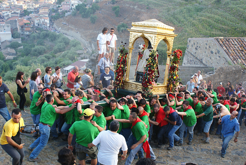 Calatabiano, Sicily, Italy. May 2009. Every year the towns local saint San Filippo is brought on the shoulders of many men up the hill to the church. A catholic, religious tradition carried on for hundreds of years.