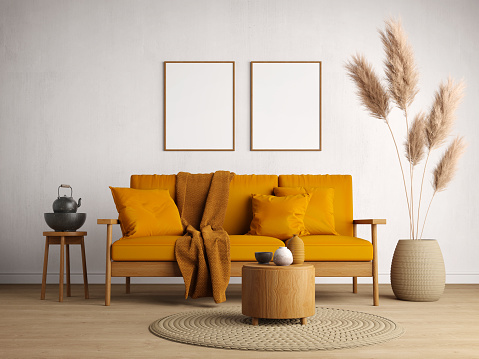 Living room interior.Wooden sofa with yellow cushion on white wall background and blank picture frame.3d rendering