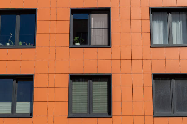 istock background with windows of a modern residential building 1397202997