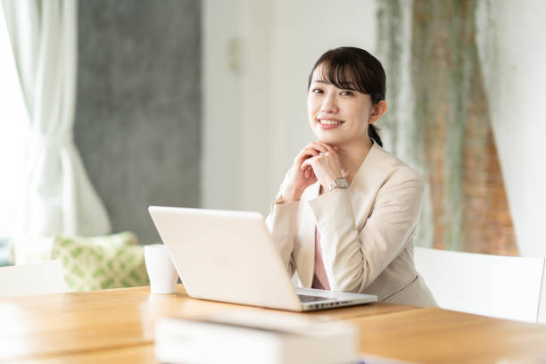 istock Business woman operating a personal computer 1397204451