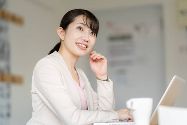 istock Business woman operating a personal computer 1397204512