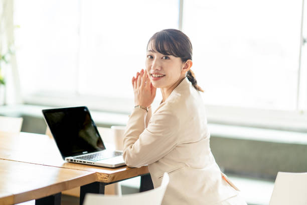 istock Business woman operating a personal computer 1397204515