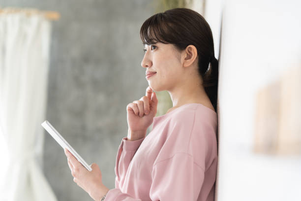 istock Business woman operating a tablet 1397205363