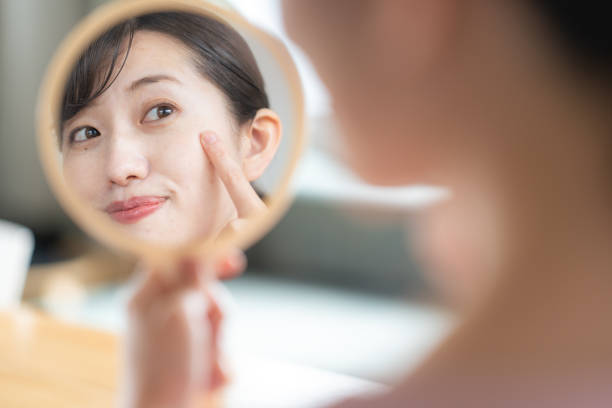 istock Woman looking in the mirror 1397205530