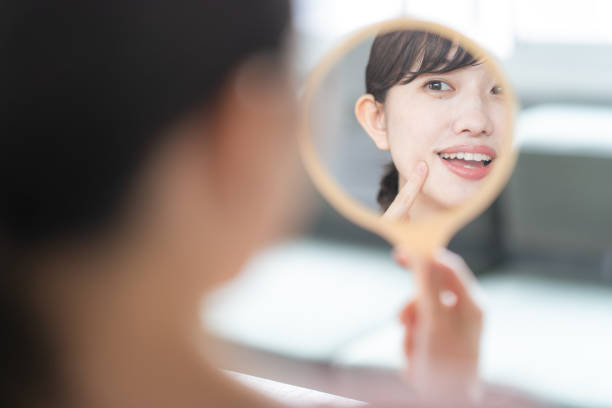 istock Woman looking in the mirror 1397205541