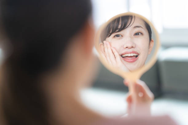 istock Woman looking in the mirror 1397205556