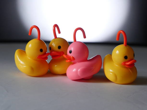 istock plastic ducks on white - Background Individuality Ideas stock photo 1397205801
