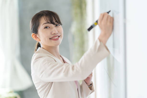 istock Business woman giving a presentation 1397205881