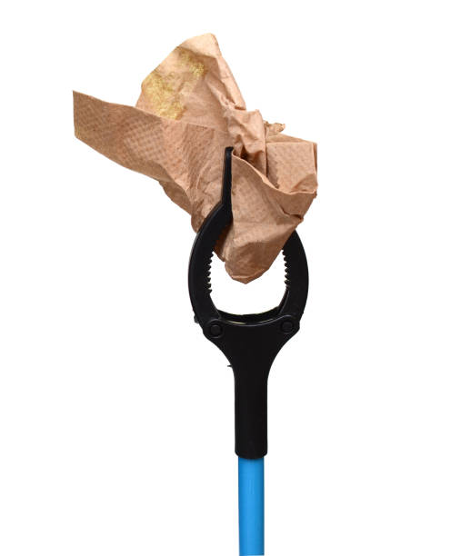 Black litter picker with napkin isolated on white background