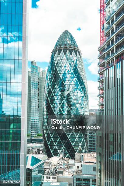 View At Construction Site With Unfinished Residential Buildings Against Blue Sky London Stock Photo - Download Image Now