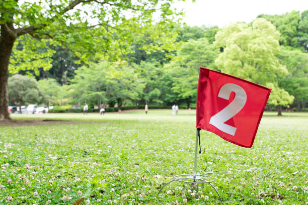 istock Park where old people enjoy park golf 1397208354