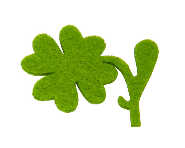 istock Clover quatrefoil green felt isolated on the white background 1397209917