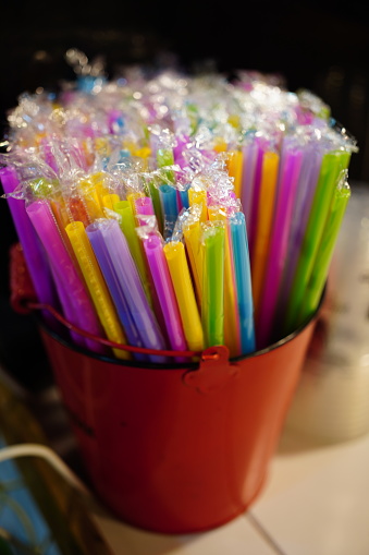 Close-up of Colorful drinking straws in box