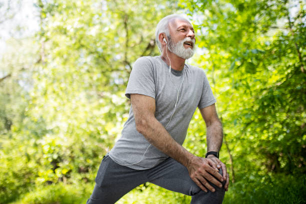 istock Senior man stretching legs 1397211980