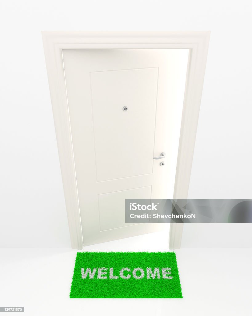 The white door and green rug. The slightly opened white door and green rug with an inscription Ajar Stock Photo
