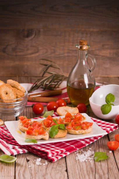 istock Friselle with cherry tomatoes and basil. 1397218045