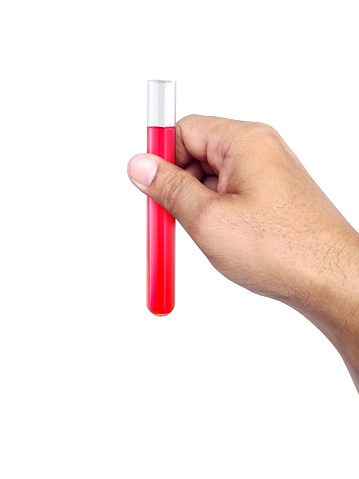 chemical test tube in hand on white isolated background