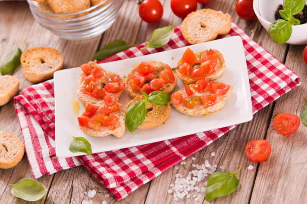 istock Friselle with cherry tomatoes and basil. 1397218380