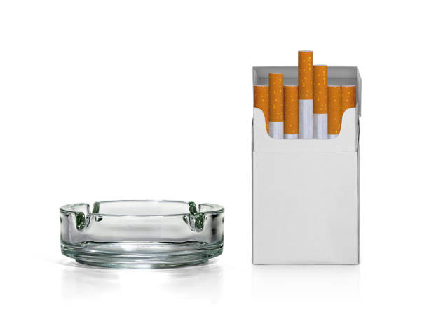 istock Cigarette pack and ashtray isolated on white background 1397218458