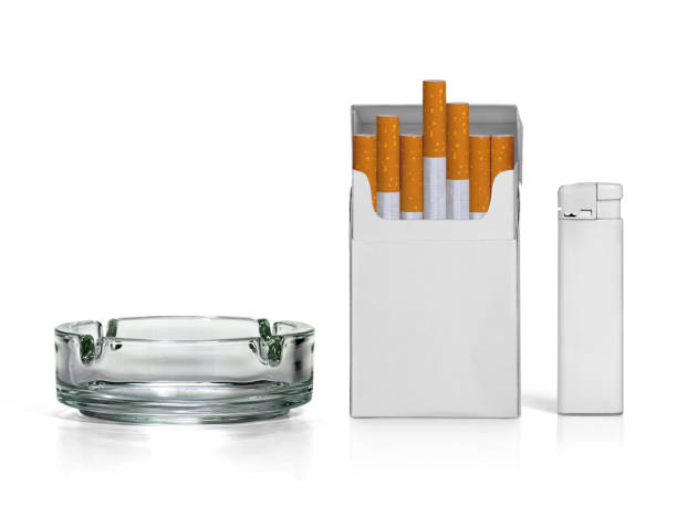 istock Cigarette pack, ashtray, and lighters isolated on white background 1397218490