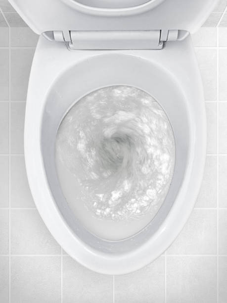 istock Toilet, Flushing Water, close up 1397220628